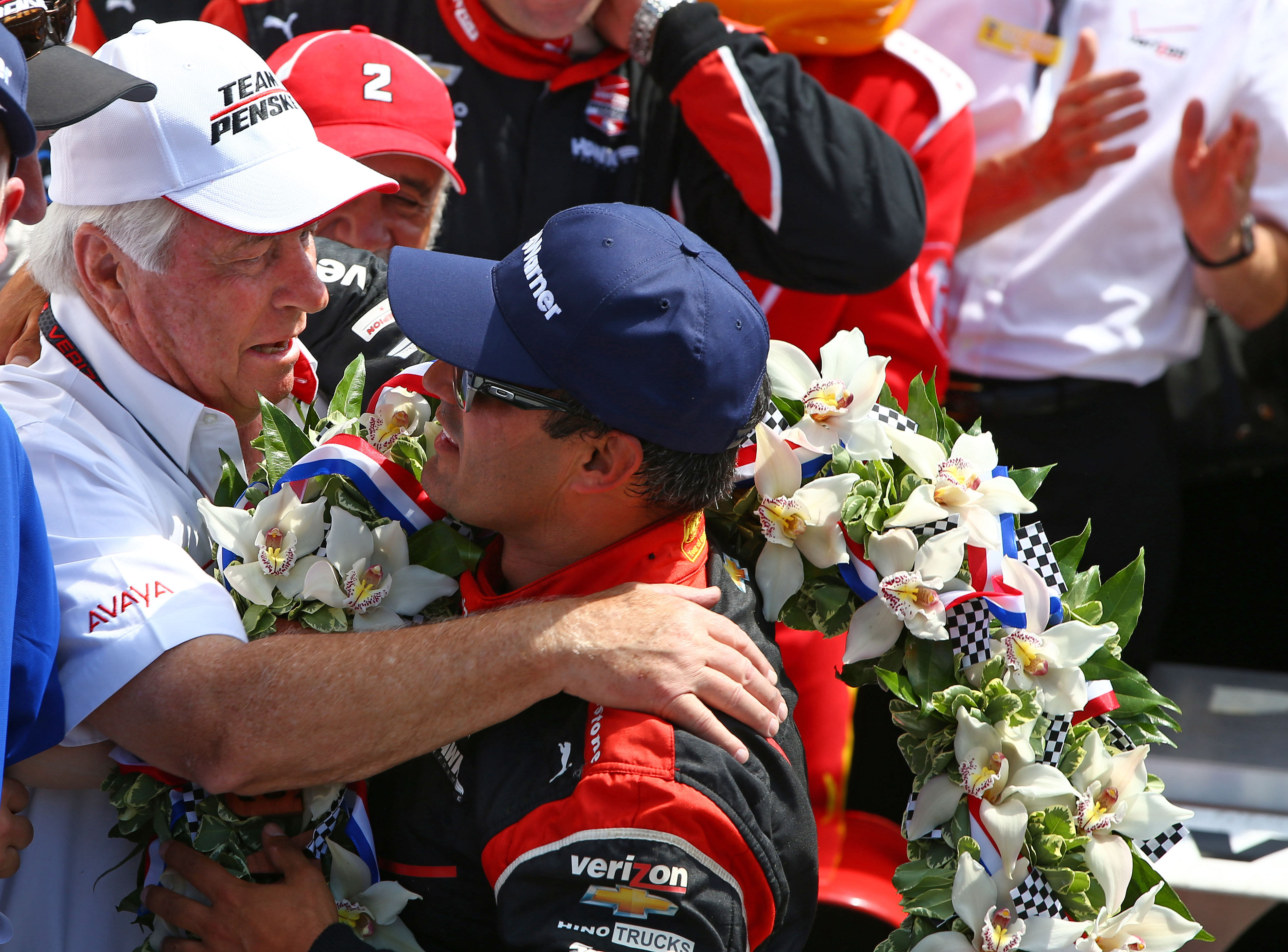 Juan Pablo Montoya celebrates with team owner Roger Penske after winning the 2015 Indianapolis 500 at Indianapolis Motor Speedway, May 24th 2015 - Source: Imagn